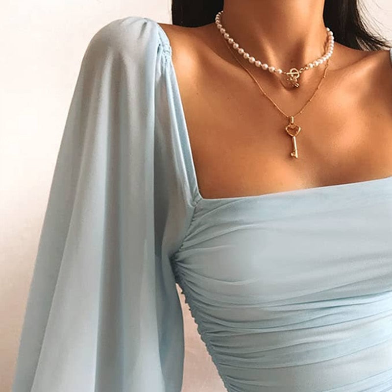 Calyra | Minikleid Rüschen Drapiert Figurbetont