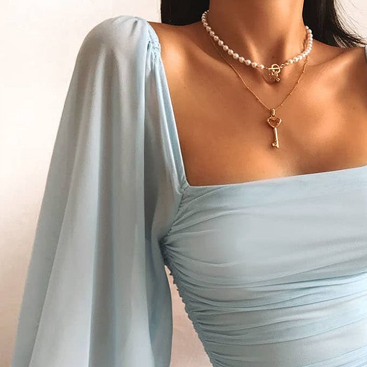Calyra | Minikleid Rüschen Drapiert Figurbetont